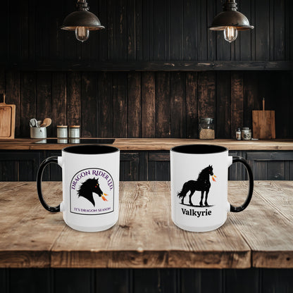 Two mugs with horse designs on a wooden table in a rustic kitchen setting.